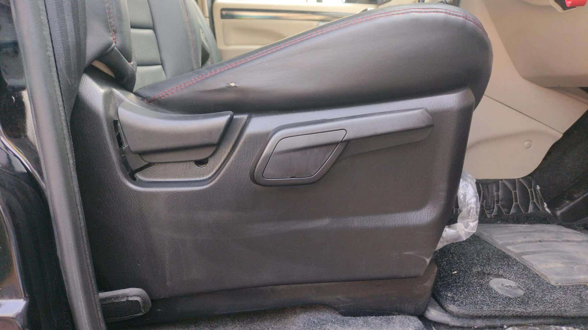 Side view of a Mahindra Scorpio Classic front seat interior