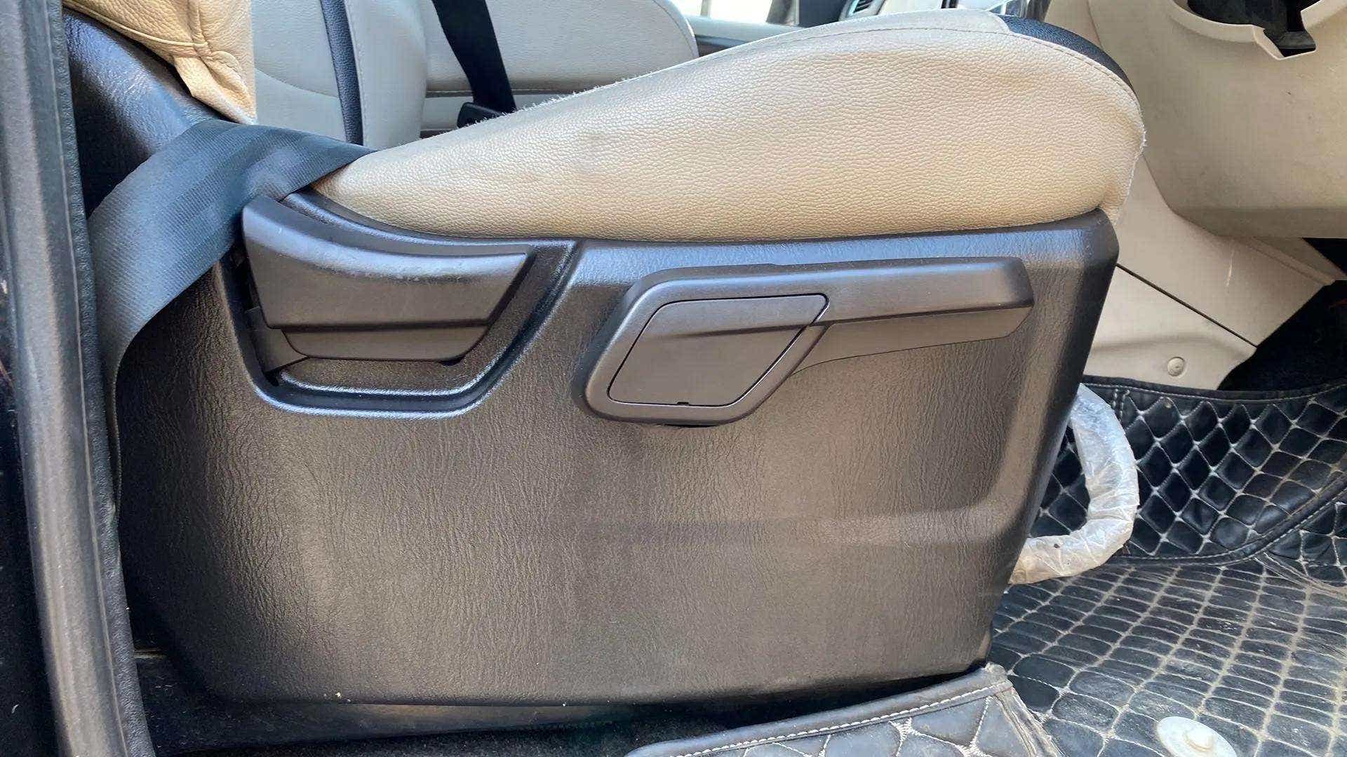Side view of a Mahindra Scorpio Classic front seat interior