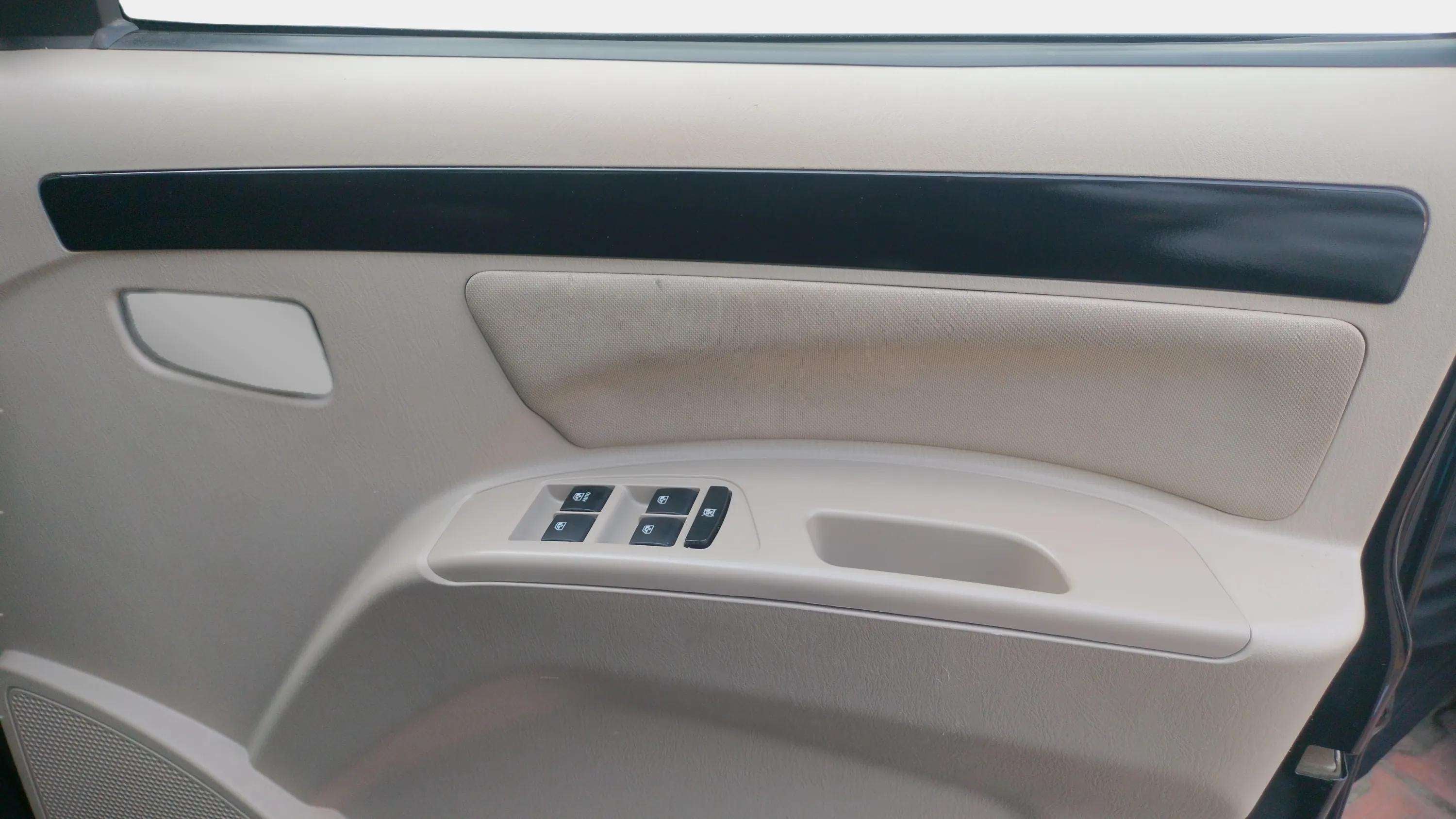 Interior door panel view of a Mahindra Scorpio Classic