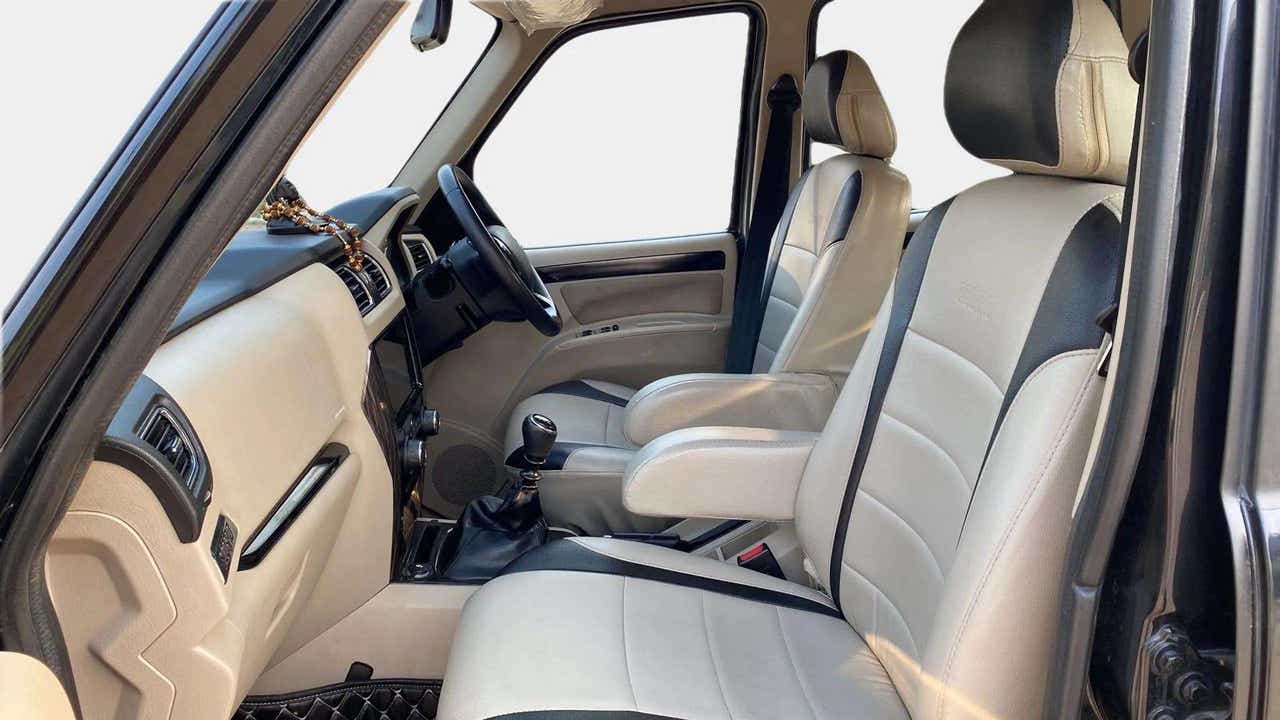 Interior front seats and dashboard of a Mahindra Scorpio Classic