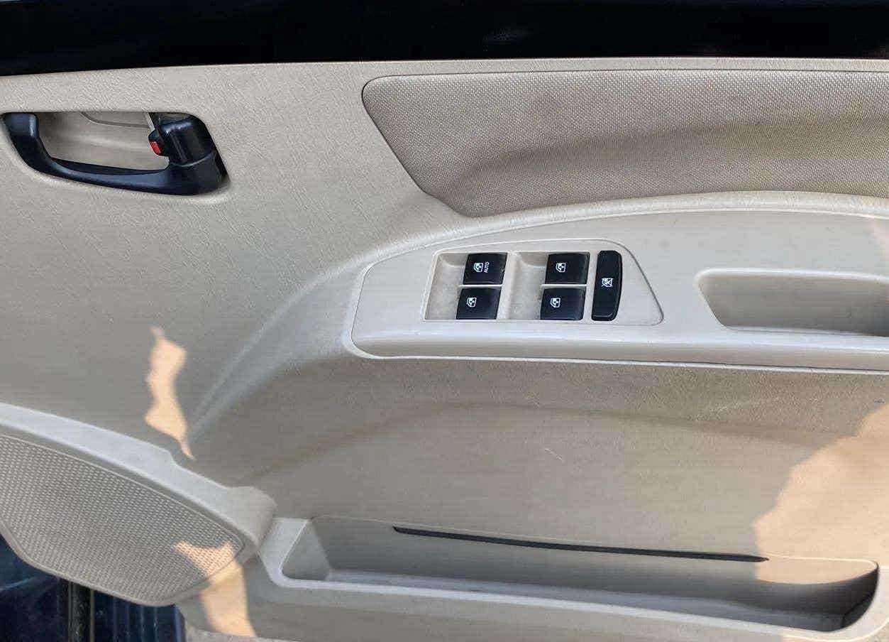 Driver side interior door panel of a Mahindra Scorpio Classic
