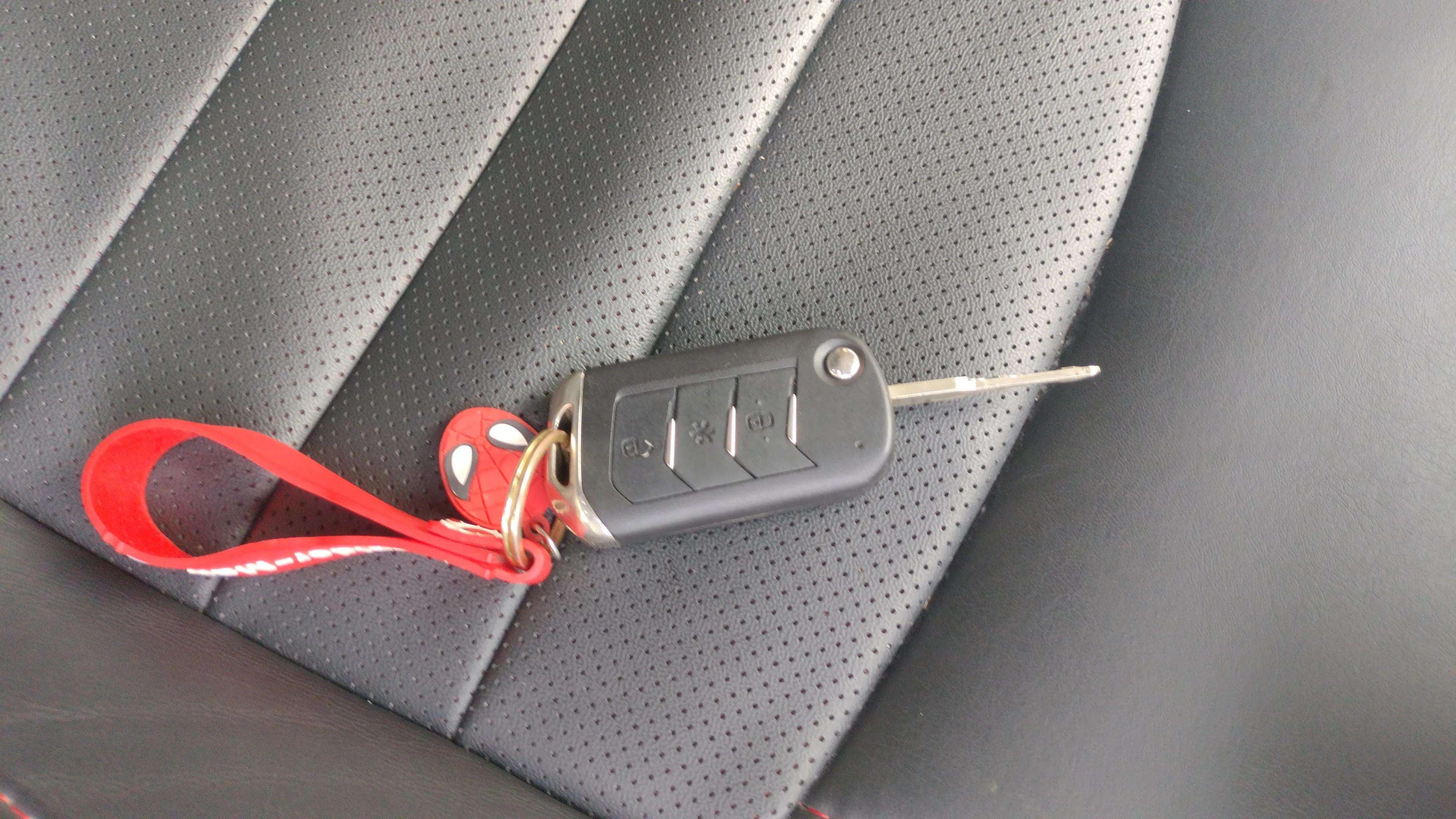 Car key on a seat of a Mahindra Scorpio Classic