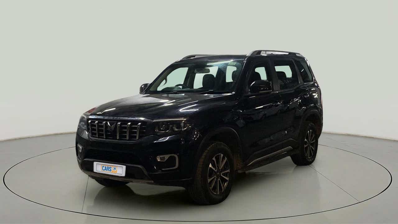 Front three-quarter view of a deep forest Mahindra Scorpio-N