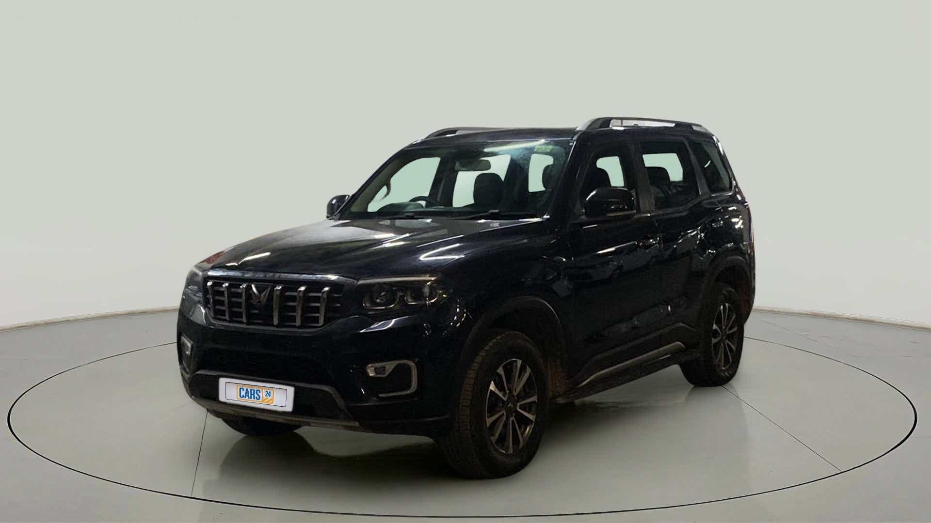 Front three-quarter view of a deep forest Mahindra Scorpio-N