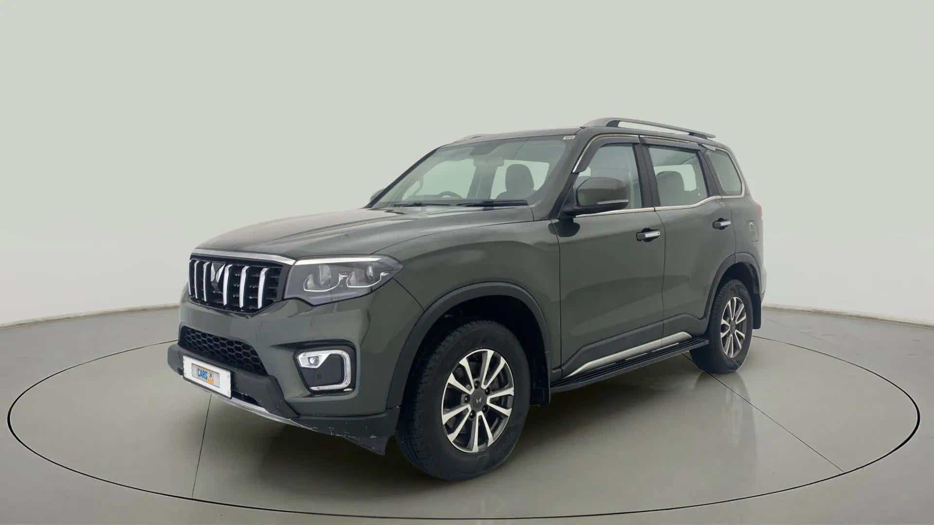 Front three-quarter view of a deep forest Mahindra Scorpio-N