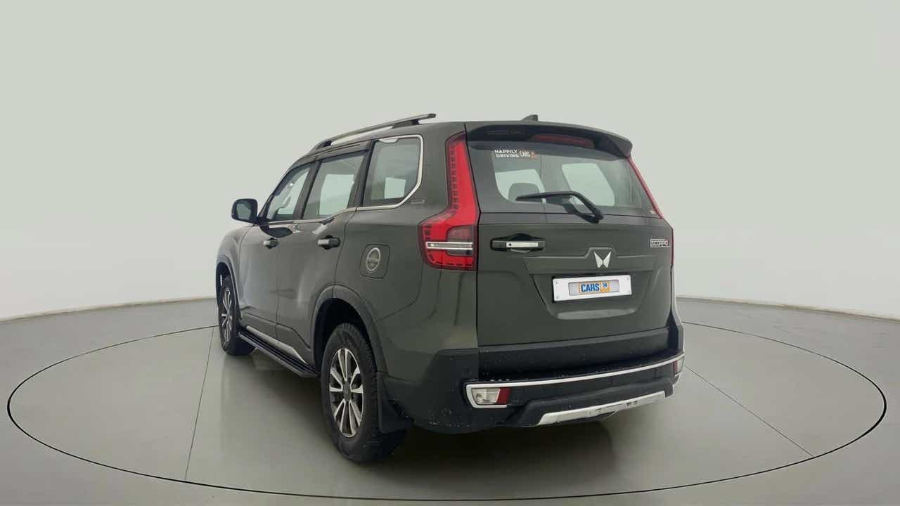 Rear three-quarter of a deep forest Mahindra Scorpio-N