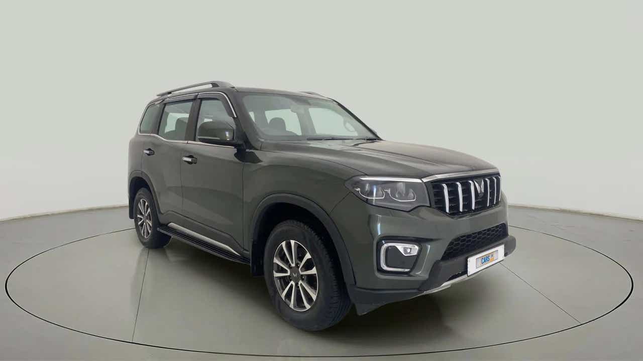 Front three-quarter view of a deep forest Mahindra Scorpio-N