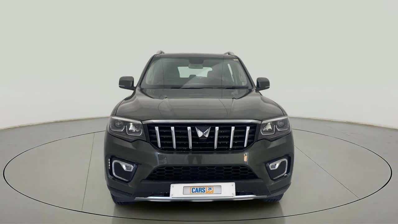 Front view of a deep forest Mahindra Scorpio-N