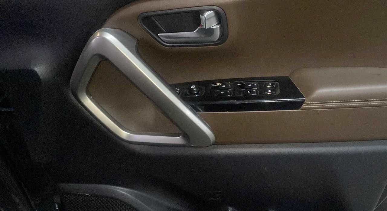 Front door panel with controls of a Mahindra Scorpio-N