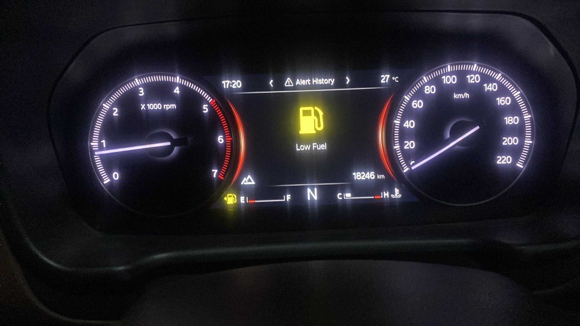 Instrument cluster of a Mahindra Scorpio-N displaying alert history and low fuel warning