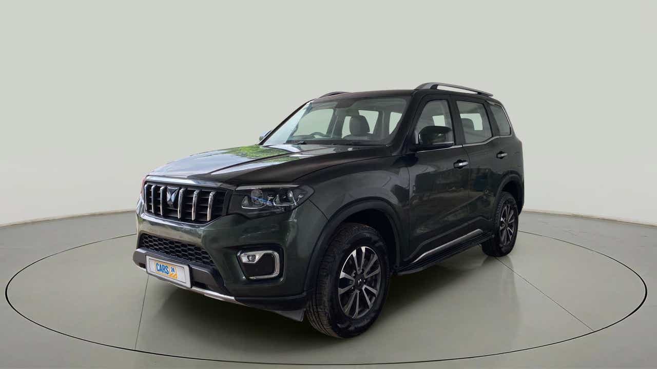 Front three-quarter view of a deep forest Mahindra Scorpio-N