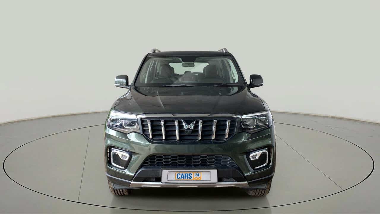 Front view of a deep forest Mahindra Scorpio-N