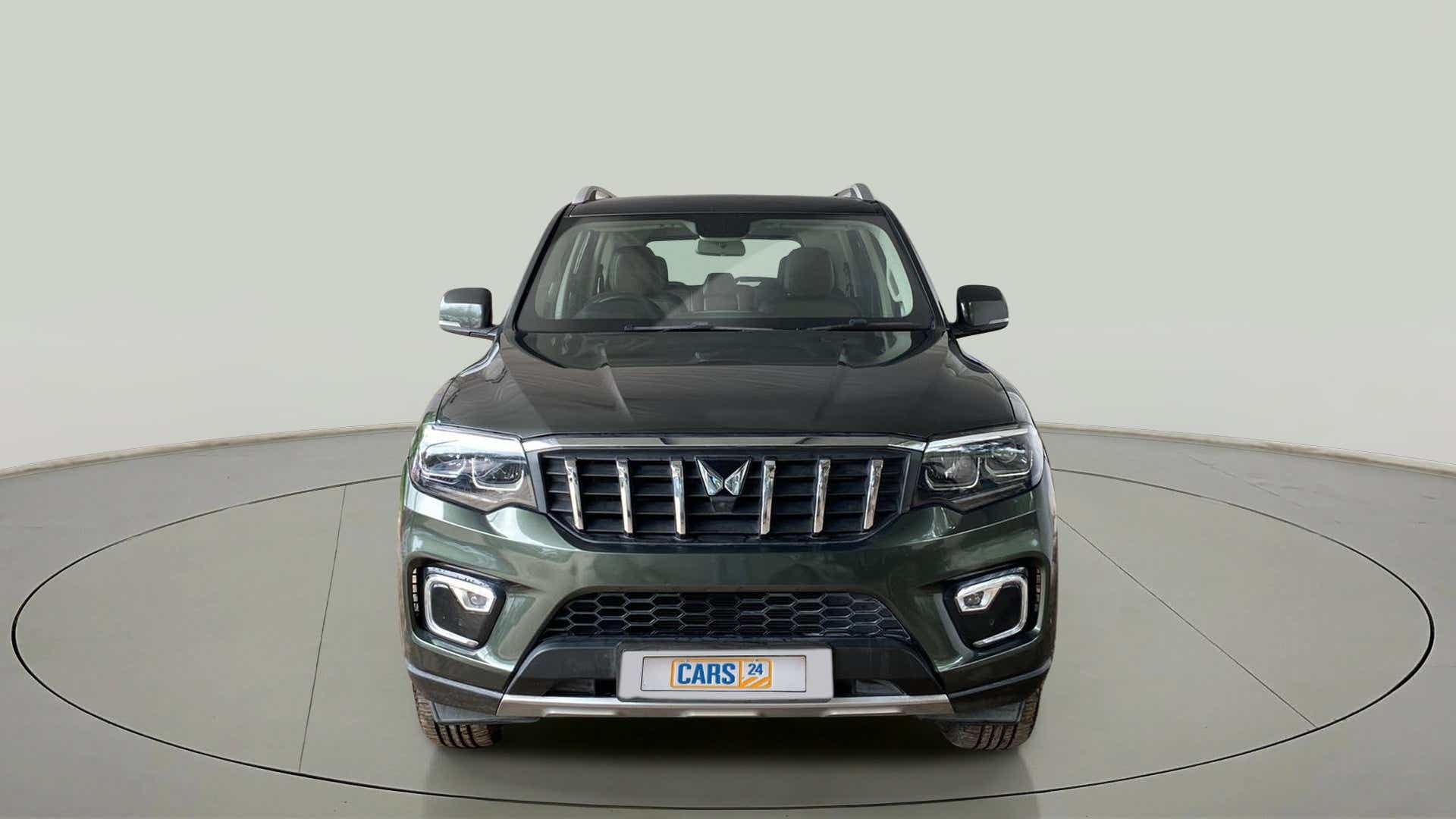 Front view of a deep forest Mahindra Scorpio-N