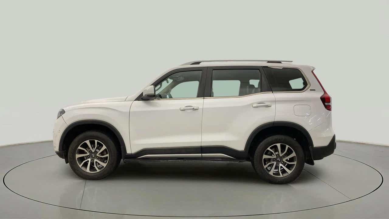 Side view of a Everest White Mahindra Scorpio-N