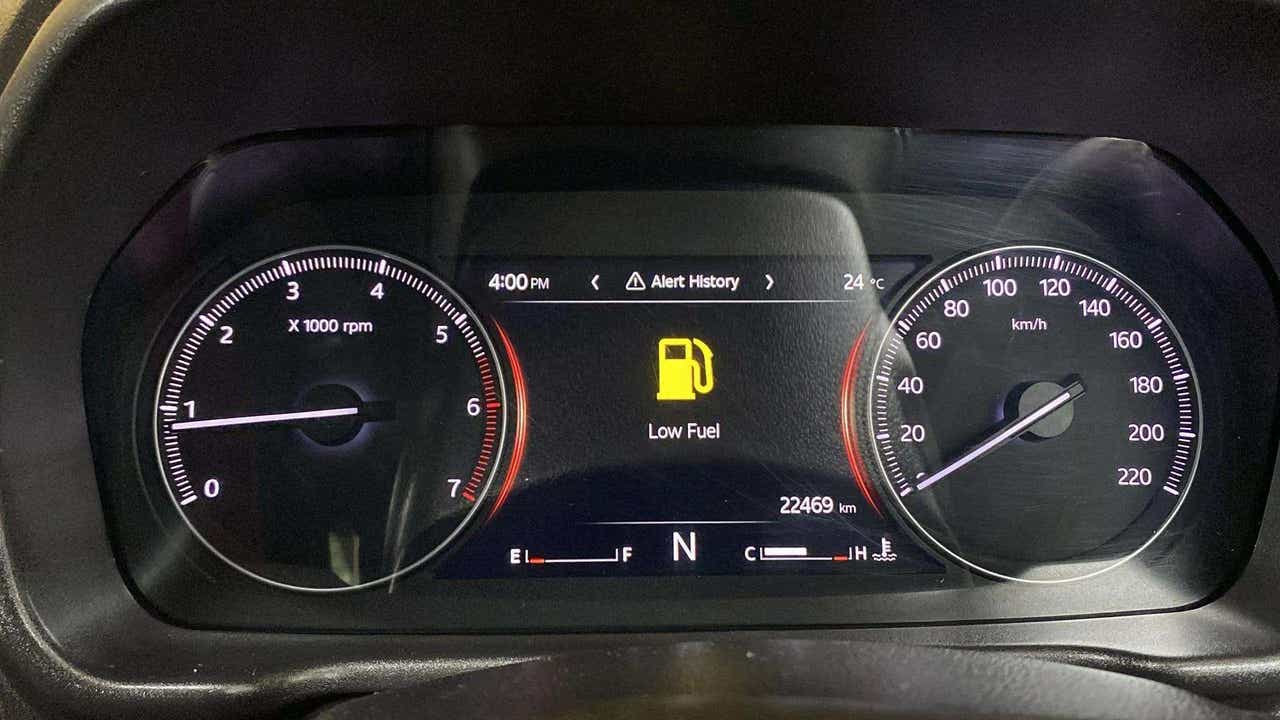 Instrument cluster of a Mahindra Scorpio-N displaying a low fuel warning