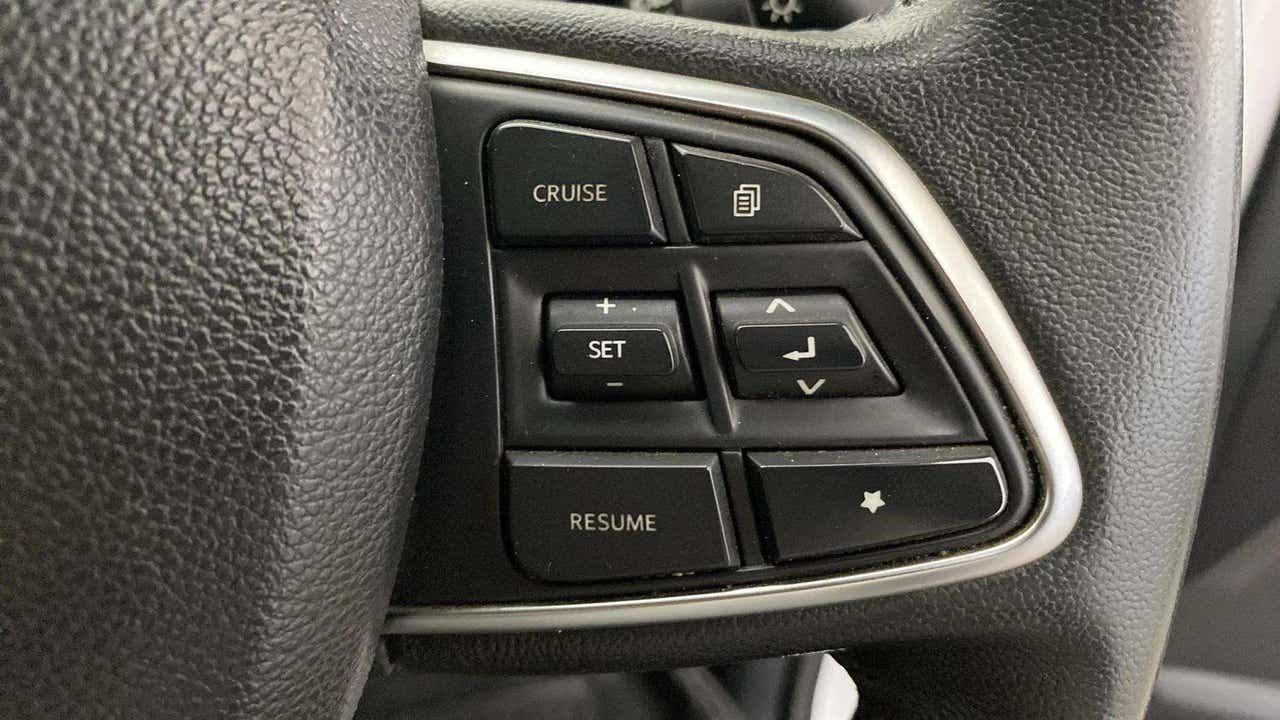 Steering wheel cruise control buttons of a Mahindra Scorpio-N