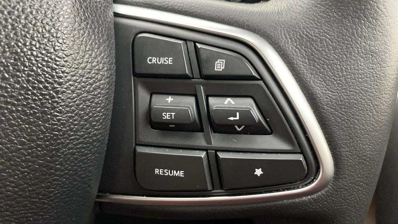 Steering wheel cruise control buttons of a Mahindra Scorpio-N