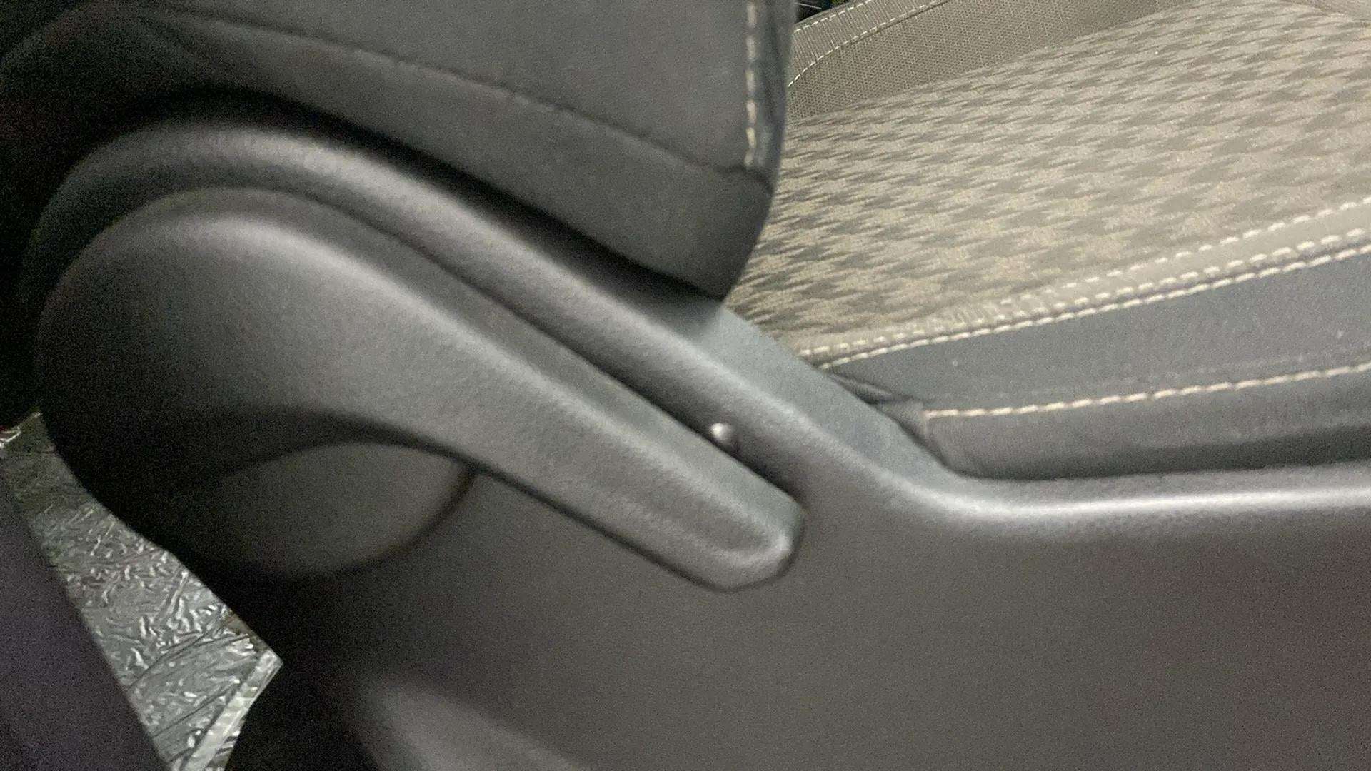 Close-up of seat adjustment lever of a Mahindra Scorpio-N