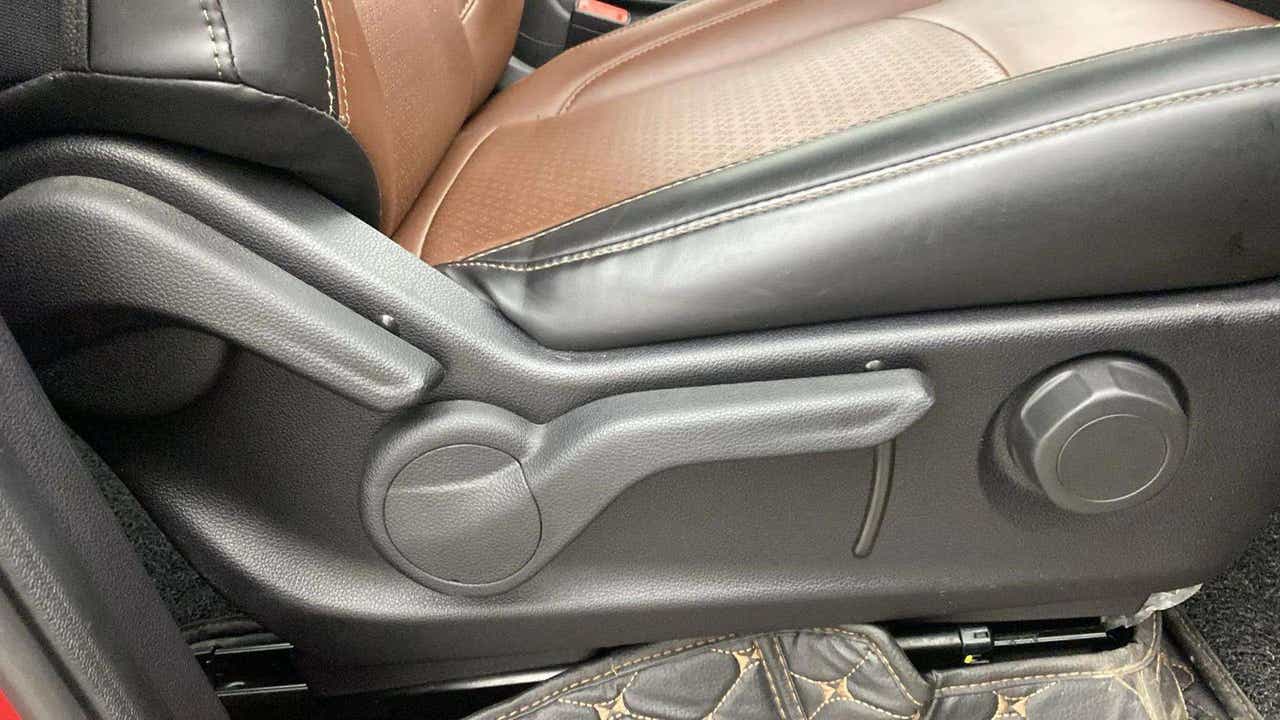 Front seat adjustment lever of a Mahindra Scorpio-N