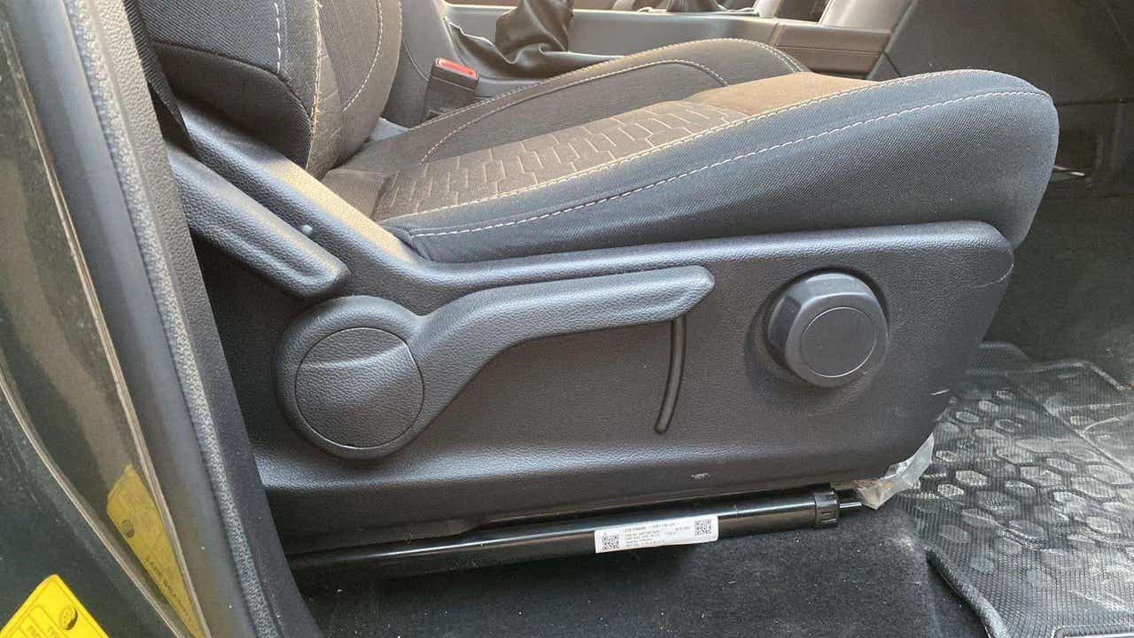 Front seat adjustment controls of a Mahindra Scorpio-N