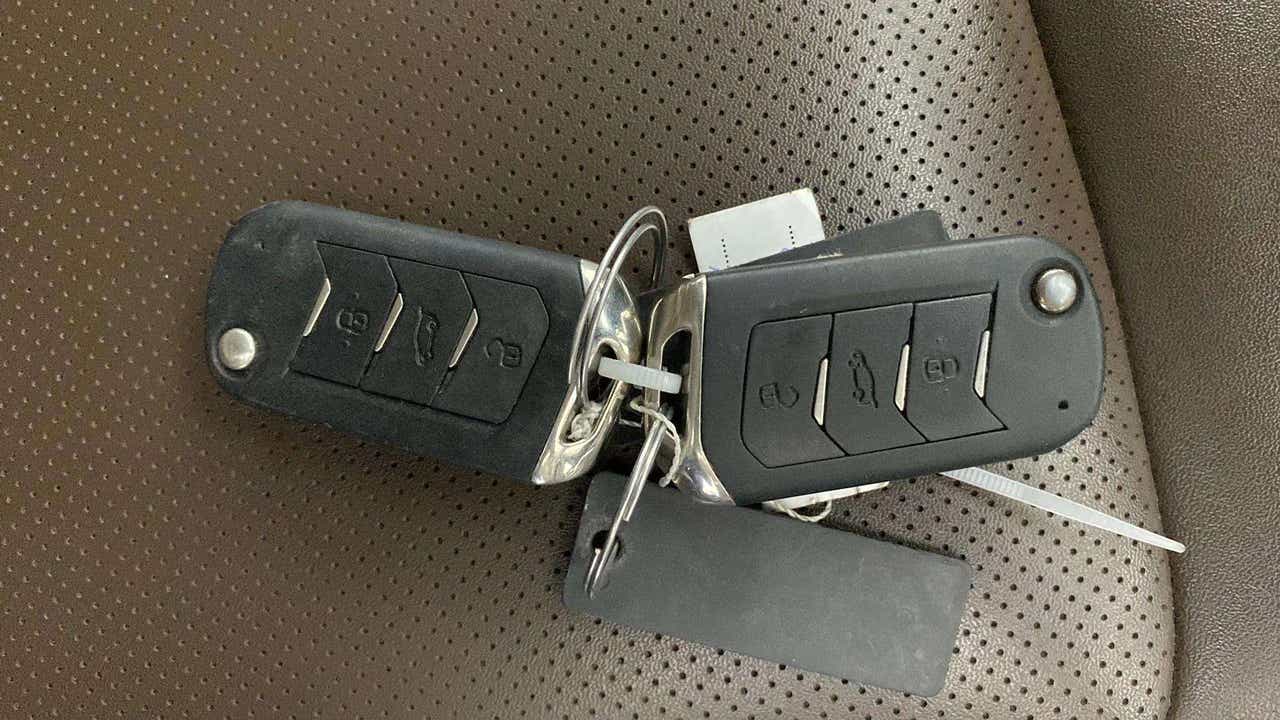Car key fobs on seat of a Mahindra Scorpio-N