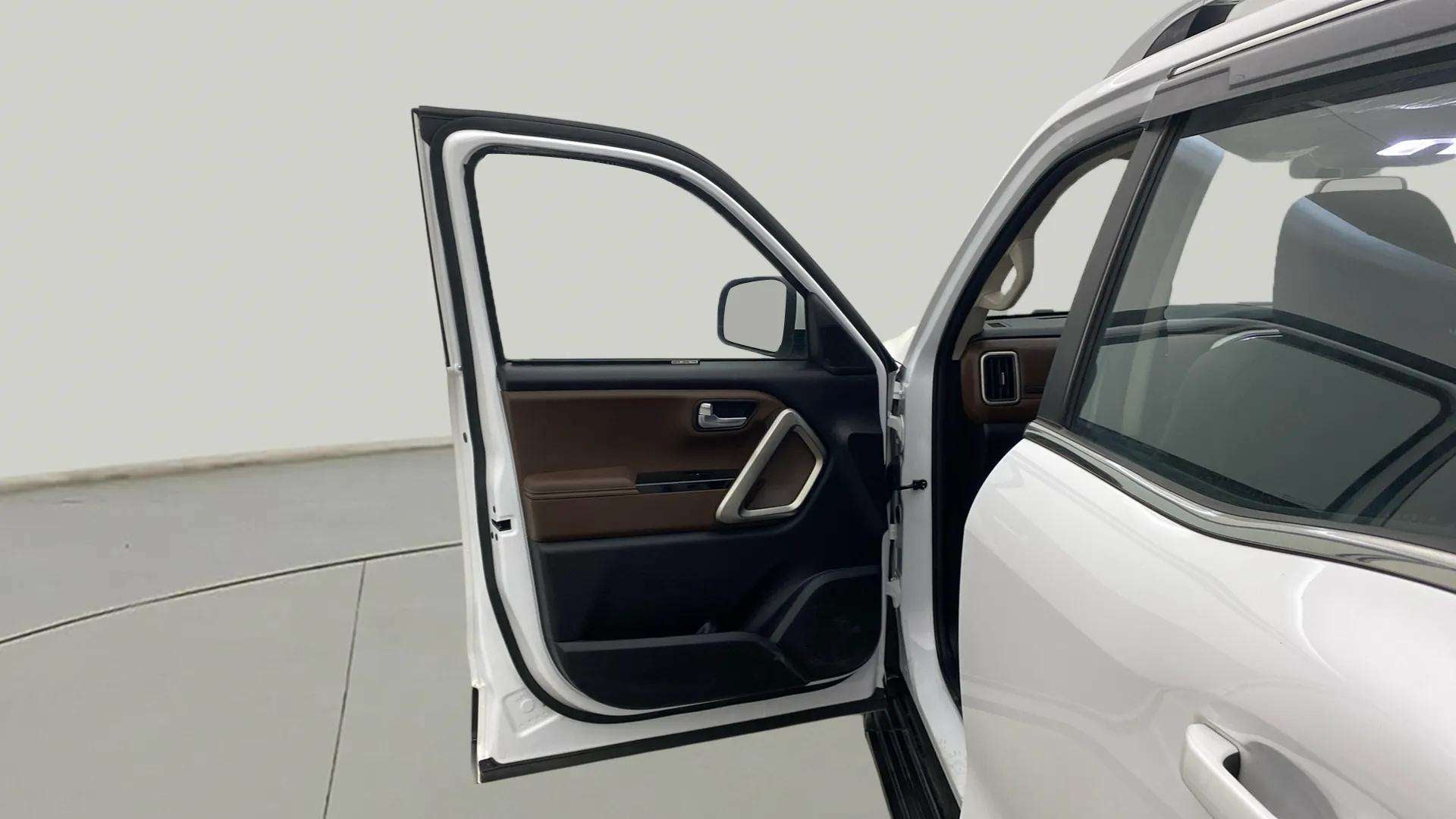 Front driver-side door open view of a Mahindra Scorpio-N