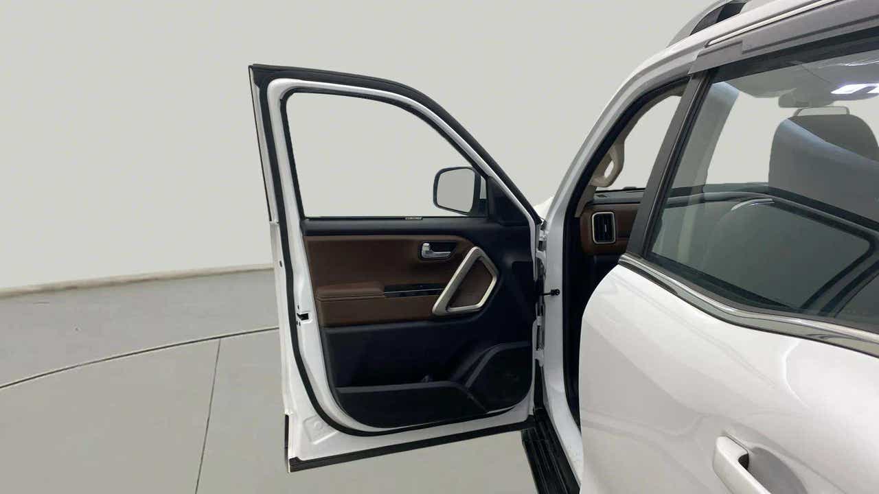 Front driver-side door open view of a Mahindra Scorpio-N