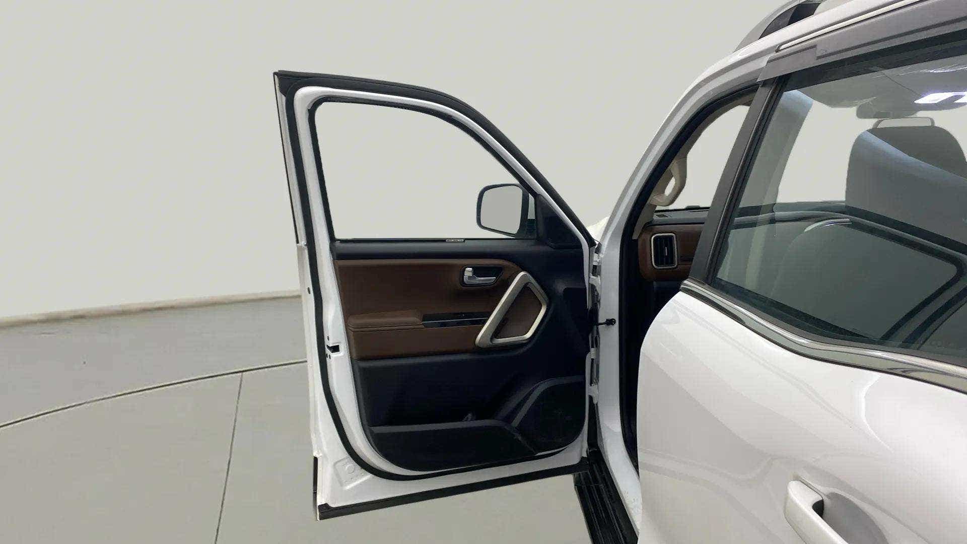 Front driver-side door open view of a Mahindra Scorpio-N