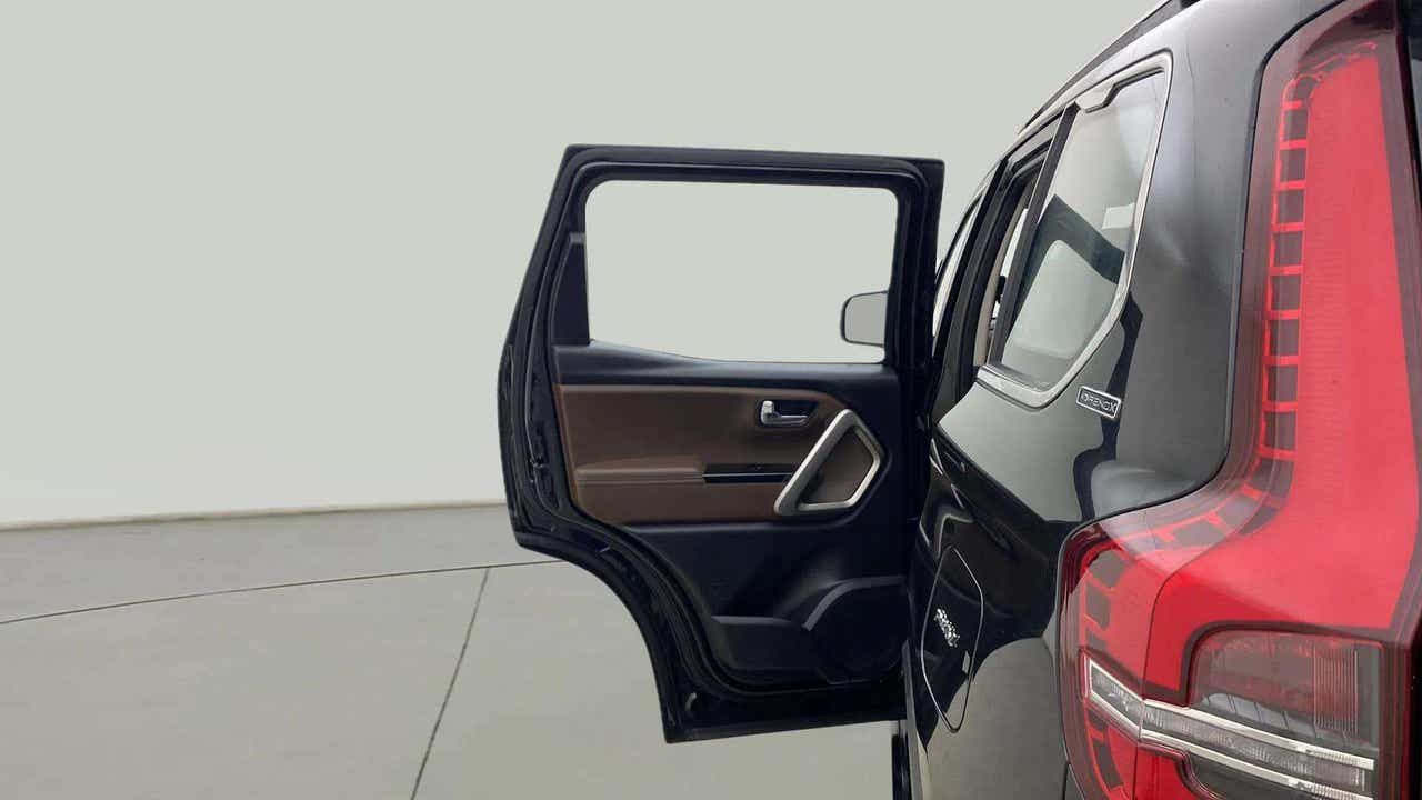 Rear door and taillight view of a Mahindra Scorpio-N