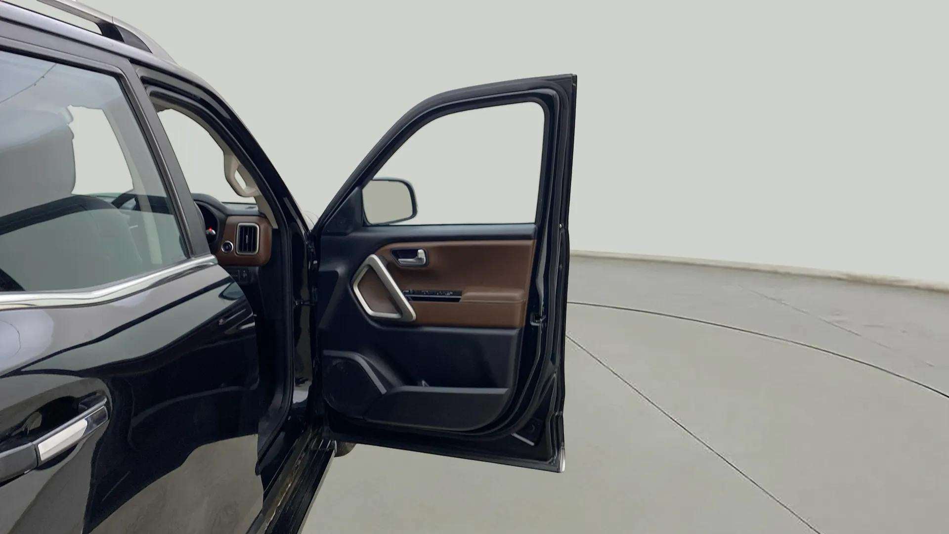 Front driver door open view of a Mahindra Scorpio-N