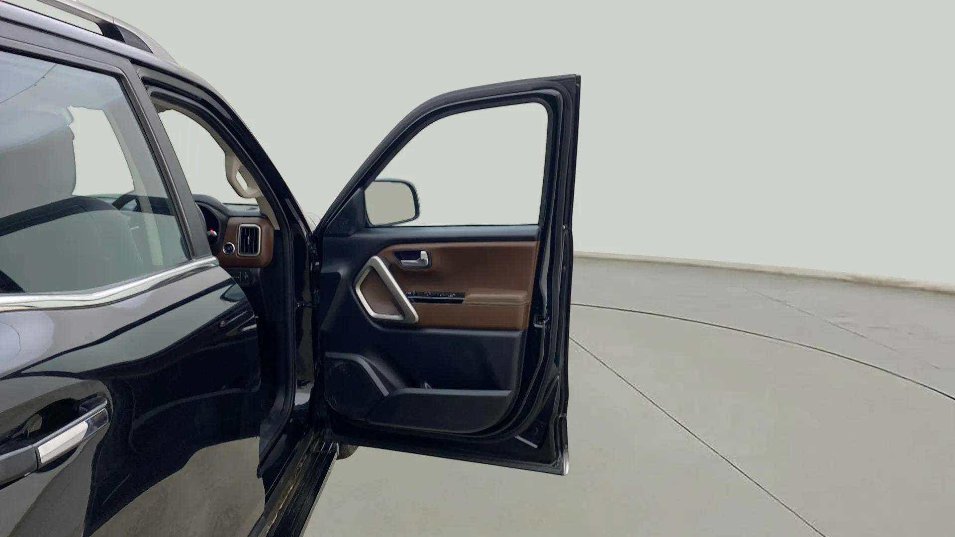 Front driver door open view of a Mahindra Scorpio-N