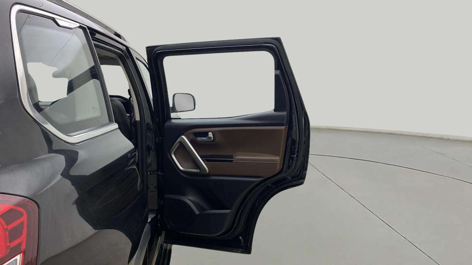 Rear left door open view of a Mahindra Scorpio-N