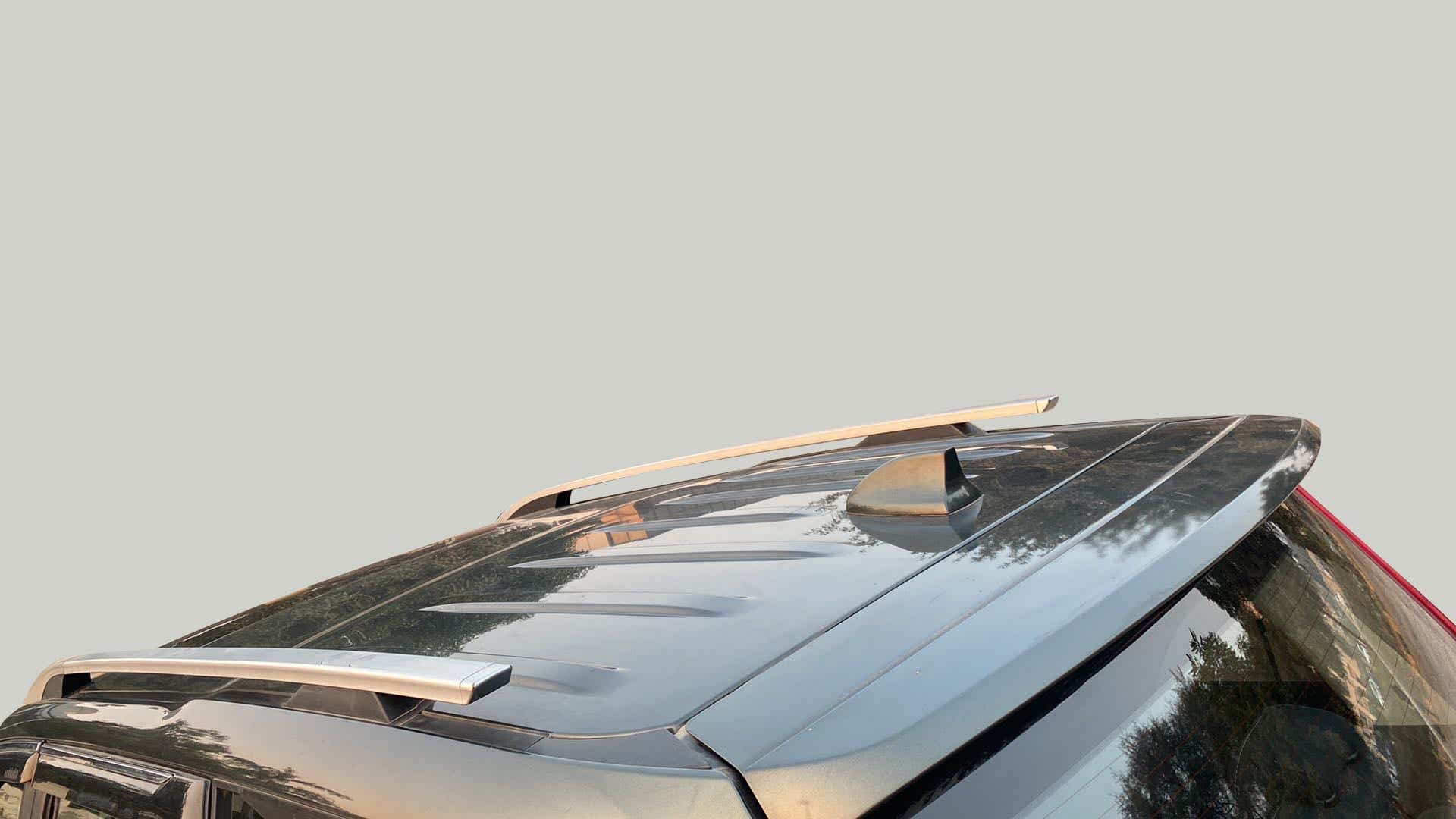 Roof rails and shark fin antenna of a Mahindra Scorpio-N