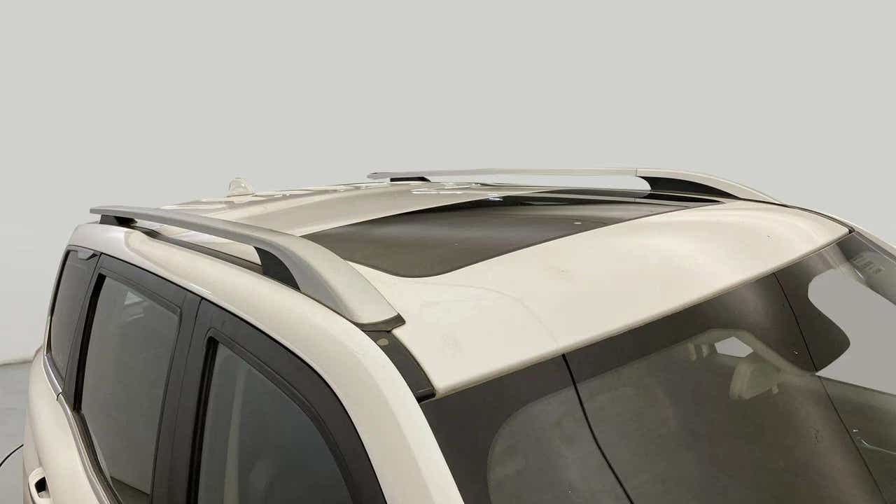 Sunroof and roof rails of a Everest White Mahindra Scorpio-N