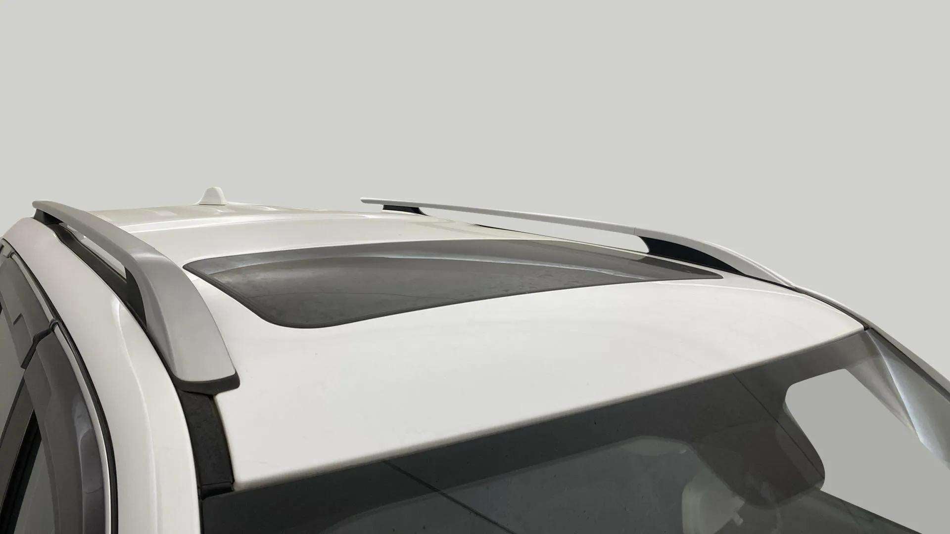 Sunroof and roof rails view of a Everest White Mahindra Scorpio-N