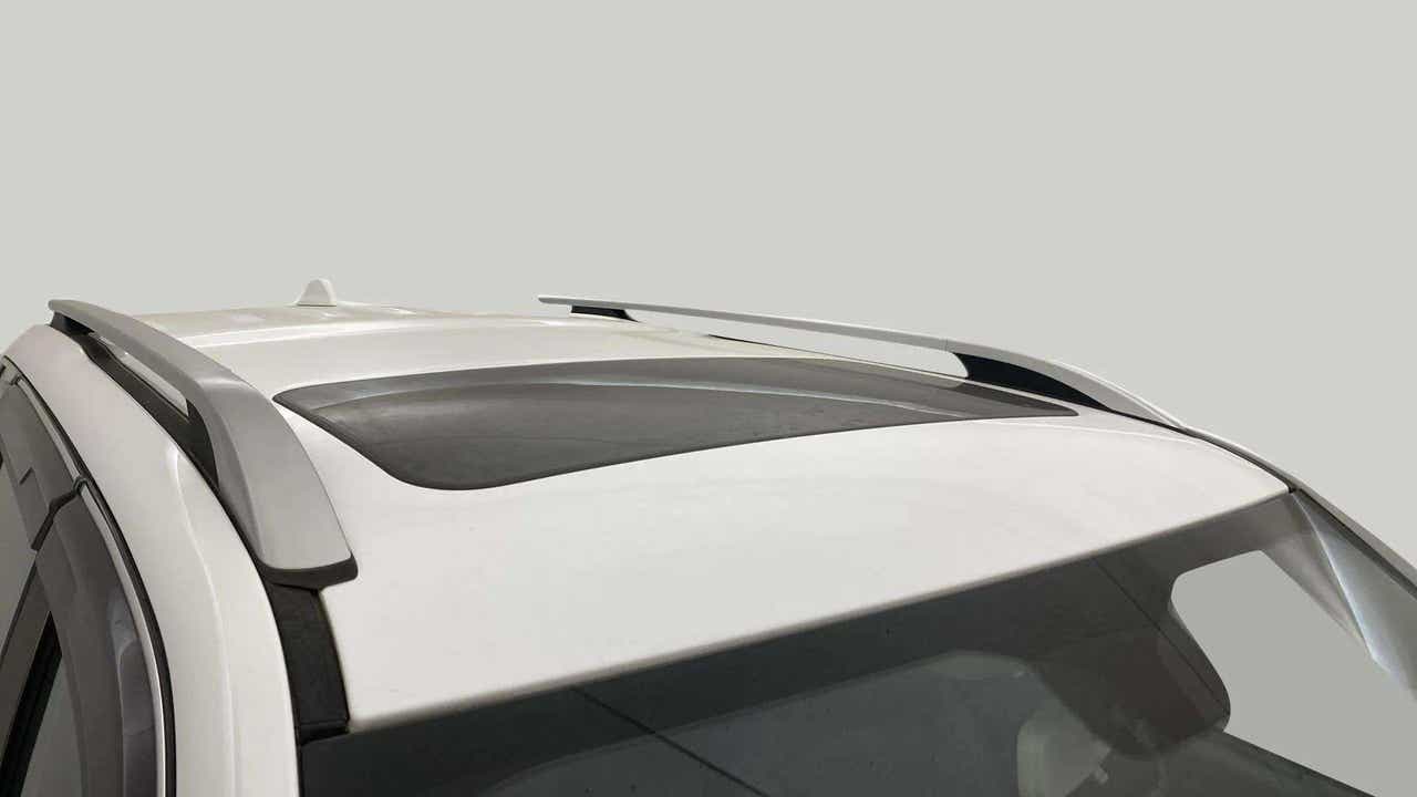 Sunroof and roof rails view of a Everest White Mahindra Scorpio-N