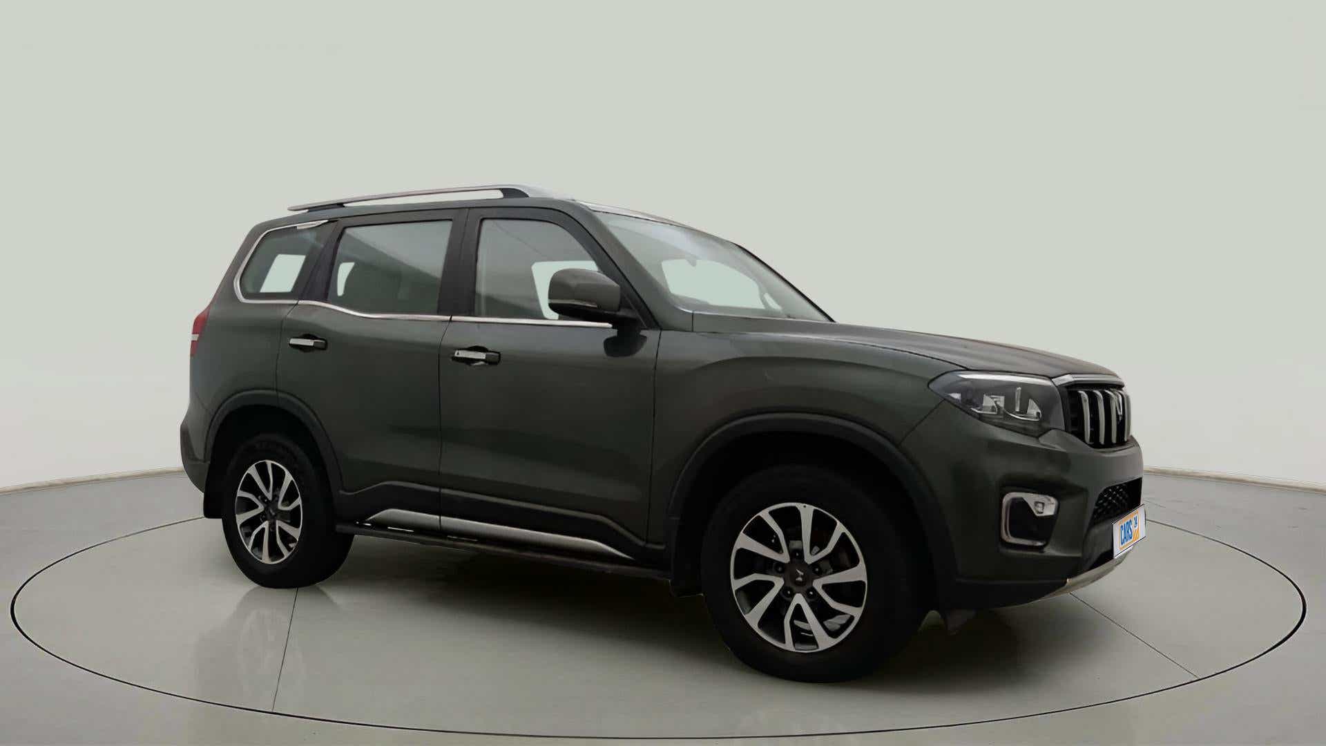 Front side view of a deep forest Mahindra Scorpio-N