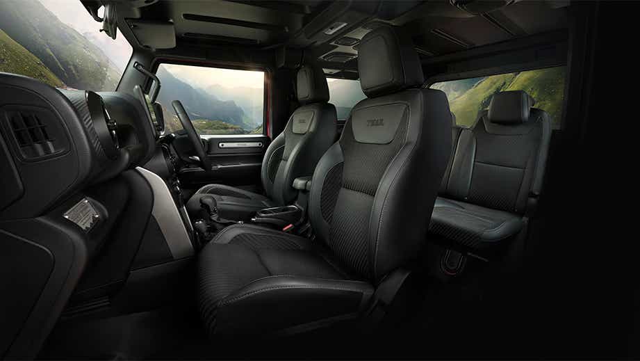 Front seats and interior view of a Mahindra Thar