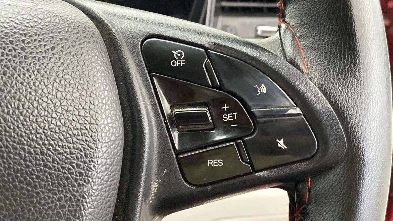 Steering wheel controls of a Mahindra XUV 3XO