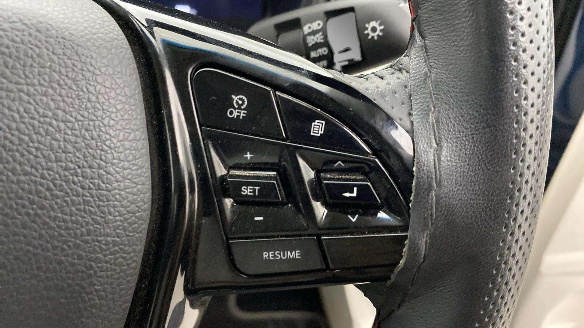 Steering wheel controls close-up of a Mahindra XUV 3XO
