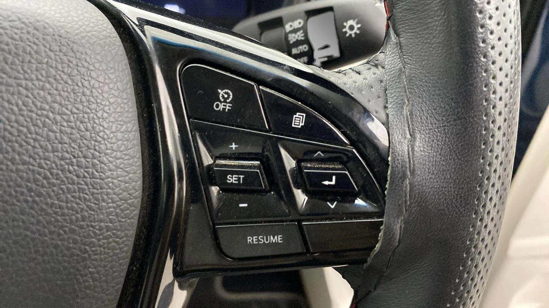 Steering wheel controls close-up of a Mahindra XUV 3XO