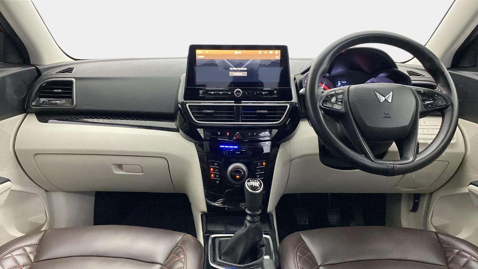 Dashboard and steering wheel view of a Mahindra XUV 3XO