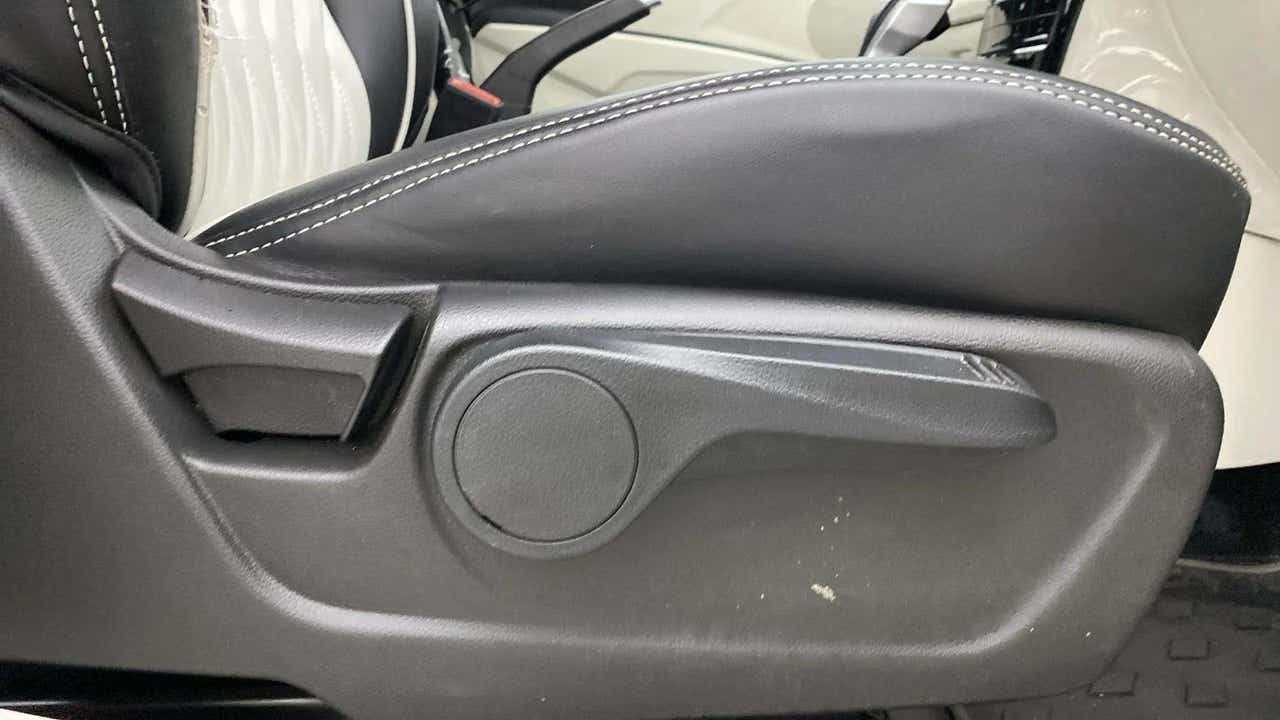 Manual seat adjustment lever close-up of a Mahindra XUV 3XO