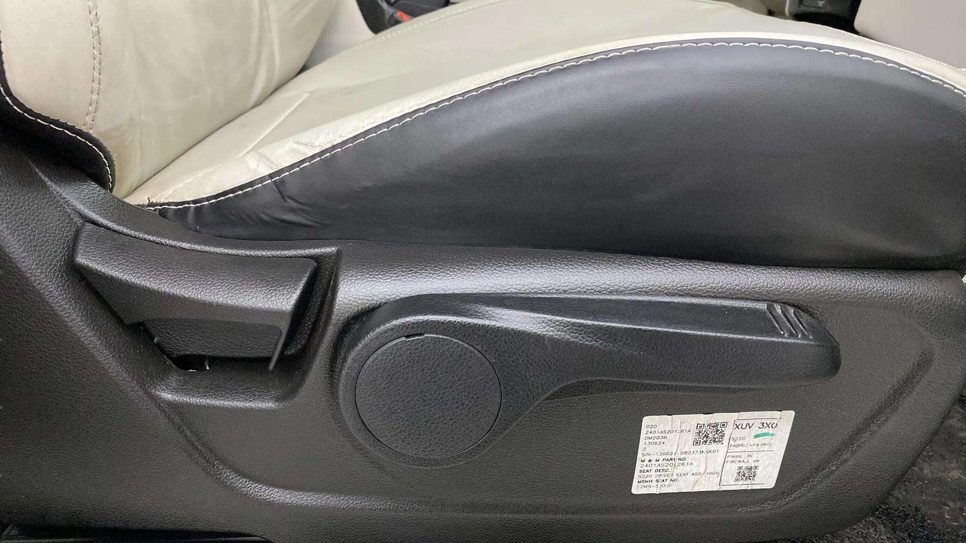 Close-up of the seat adjustment lever of a Mahindra XUV 3XO
