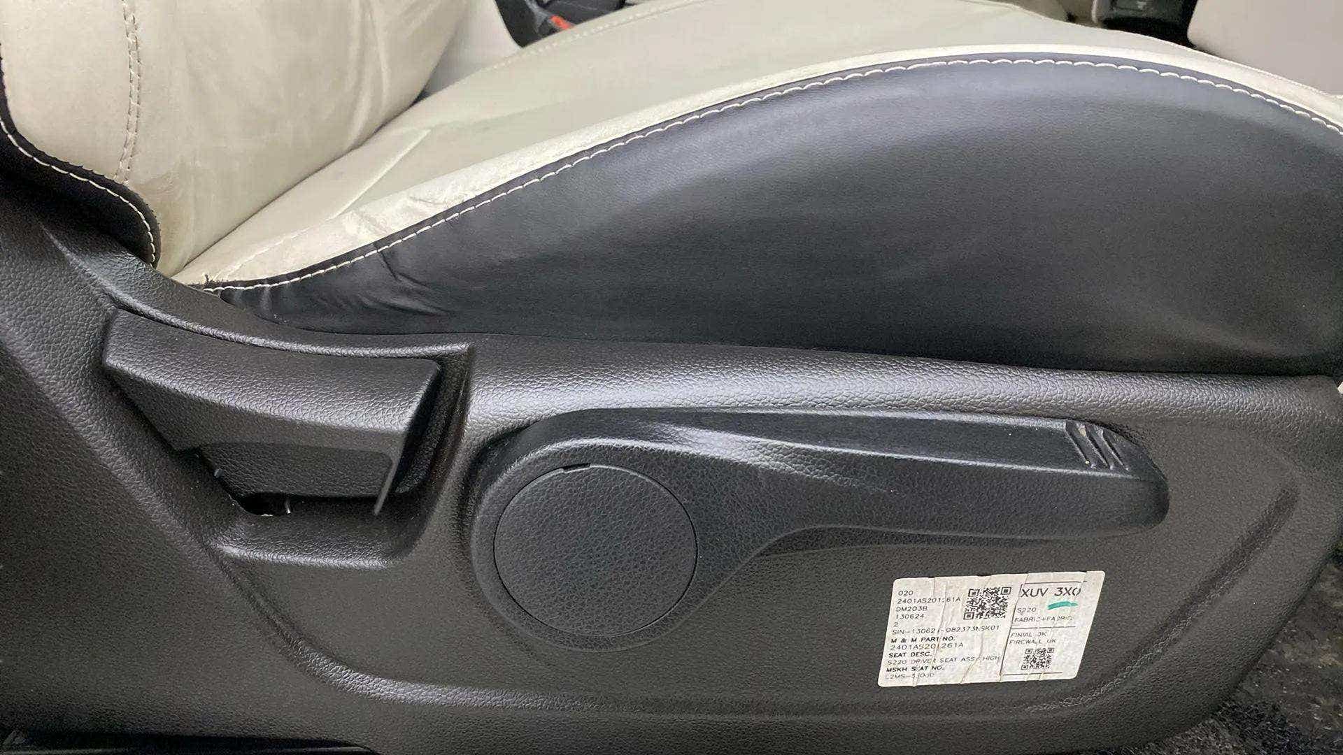 Close-up of the seat adjustment lever of a Mahindra XUV 3XO