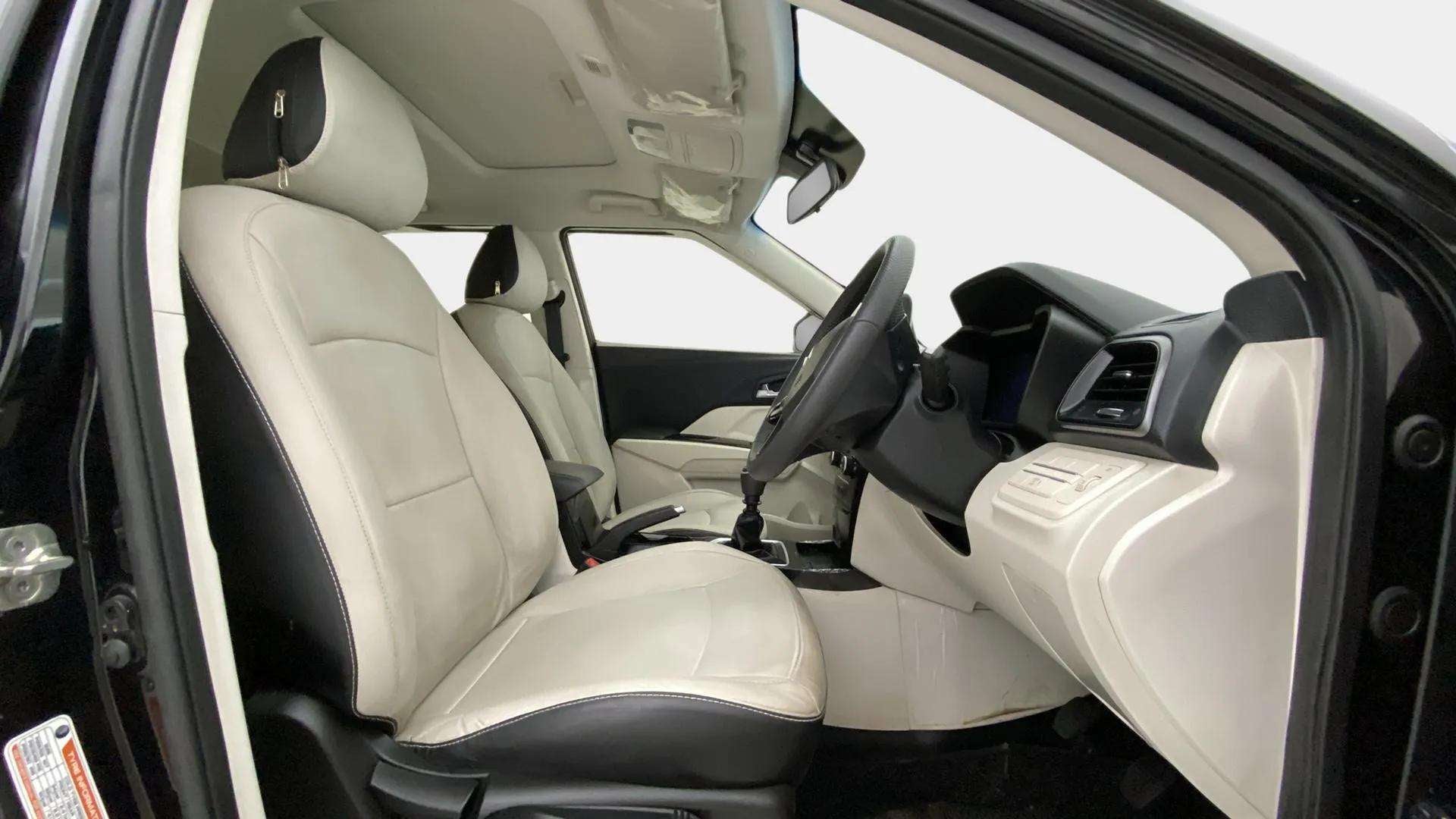 Front interior seats and dashboard of a Mahindra XUV 3XO