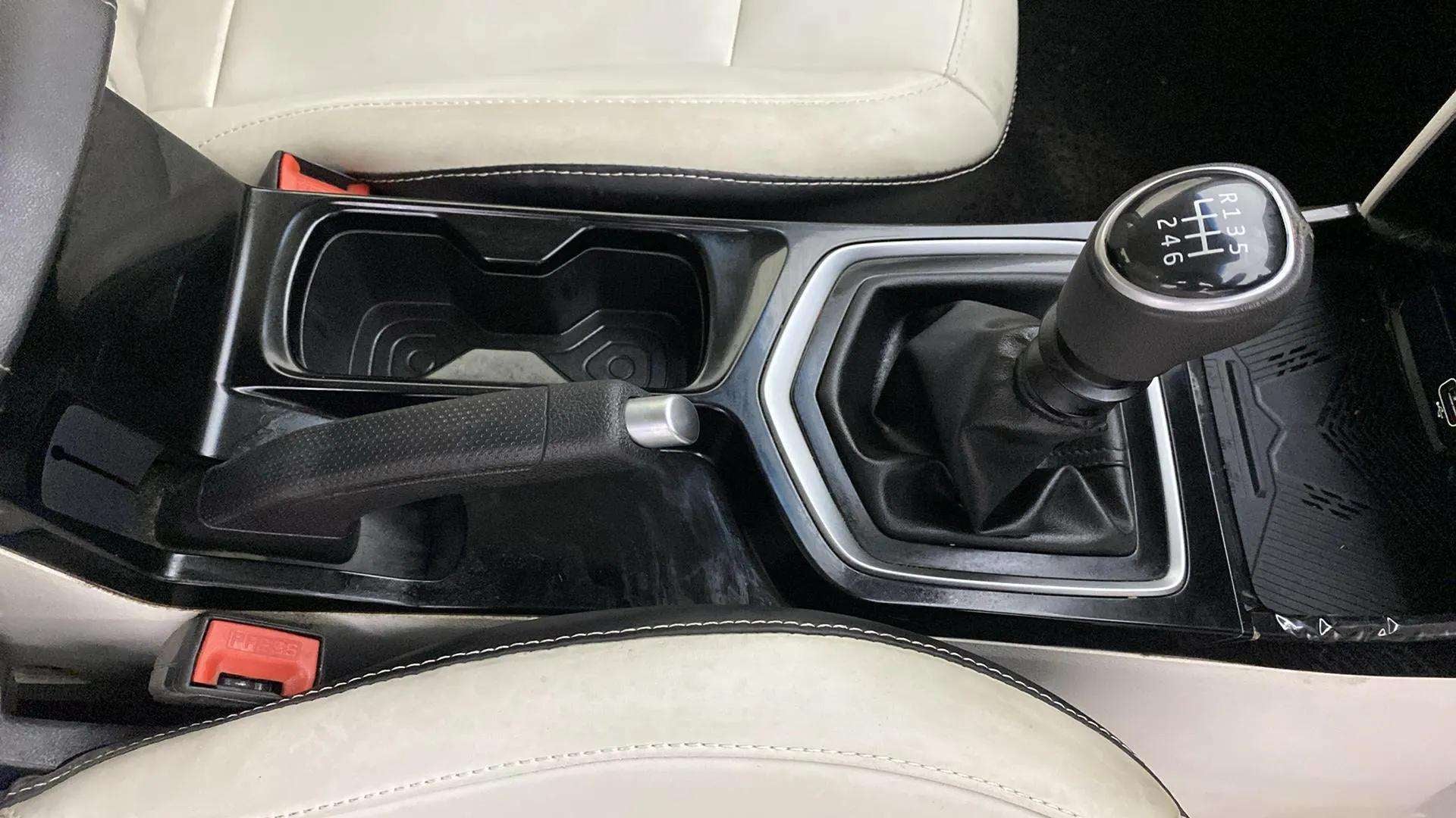 Gear lever and handbrake view of a Mahindra XUV 3XO