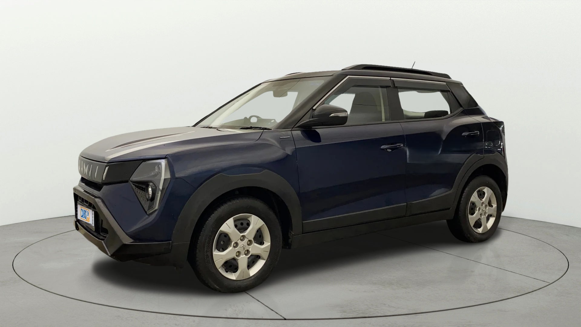 Front three-quarter view of a Mahindra XUV 3XO