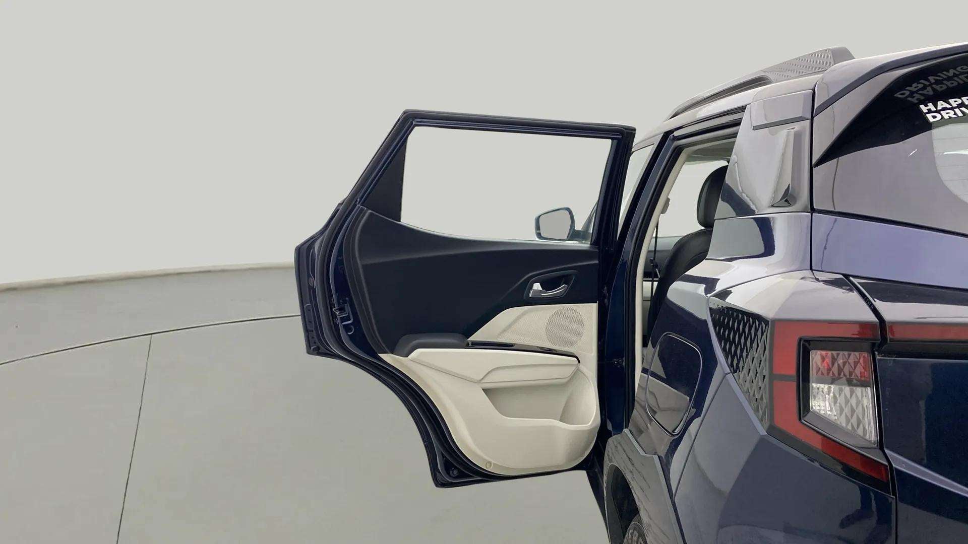 Rear door open view of a Mahindra XUV 3XO