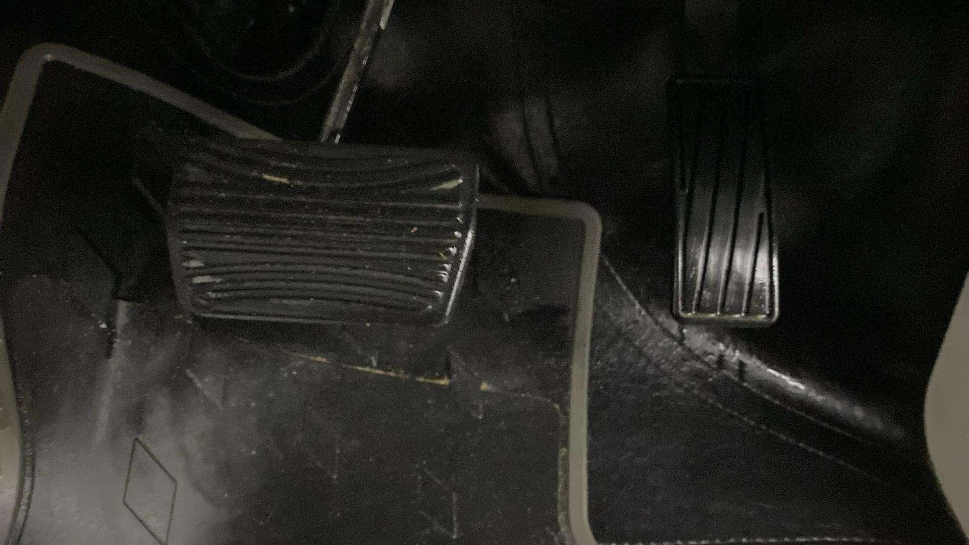 Close-up of the foot pedals in a Mahindra XUV 3XO